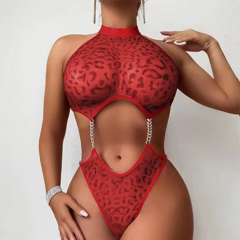 Red leopard print swimsuit worn by a model on a white background