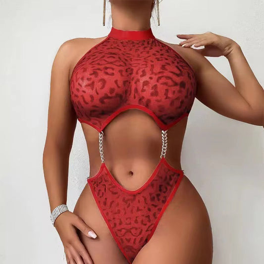 Red leopard print swimsuit worn by a model on a white background