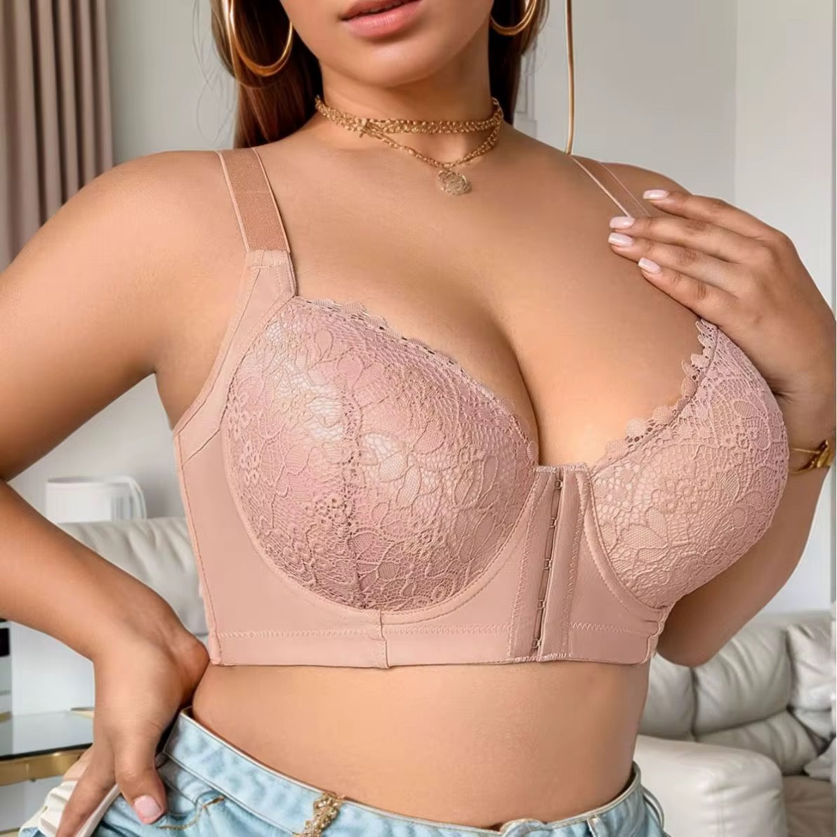 Woman wearing a pink lace bra in a casual setting