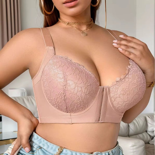 Woman wearing a pink lace bra in a casual setting