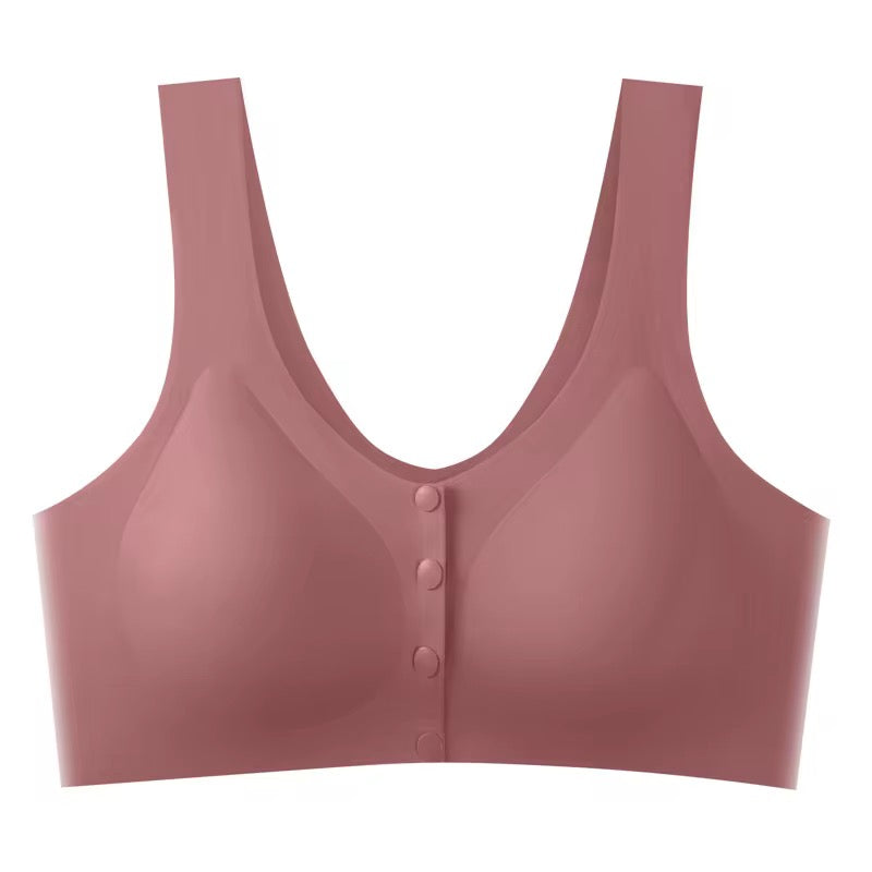 Pink bra with button details on a white background