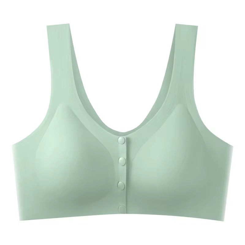 Light green bralette with button details on a white background