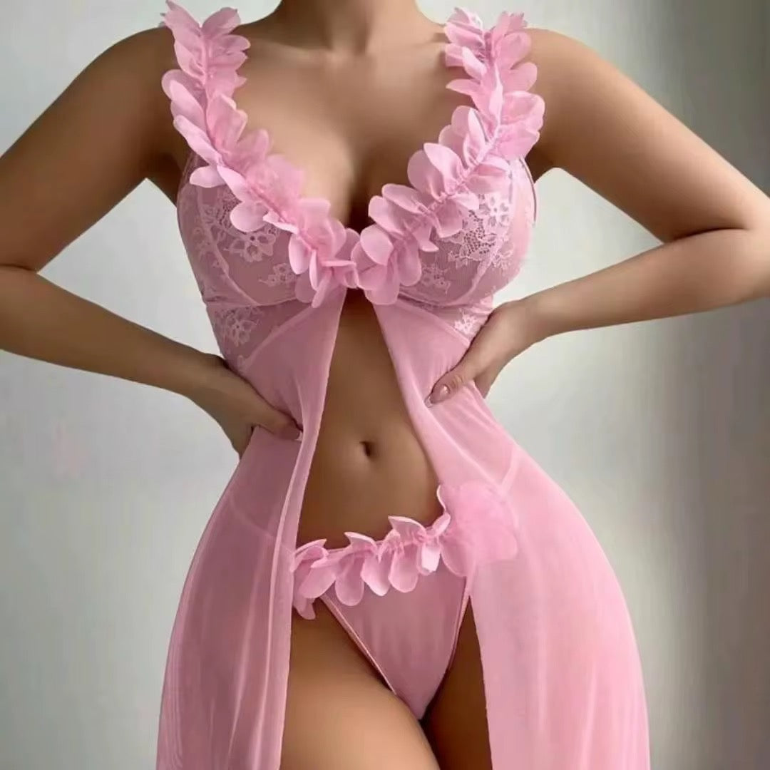 Pink lace lingerie set on a neutral background
