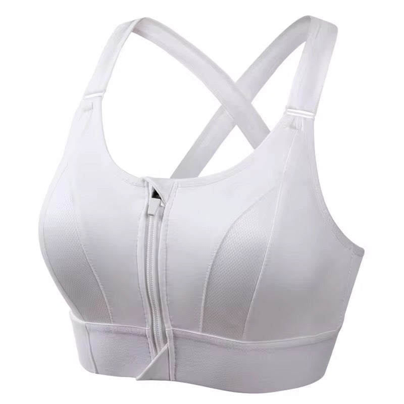 White sports bra with criss-cross straps on a white background