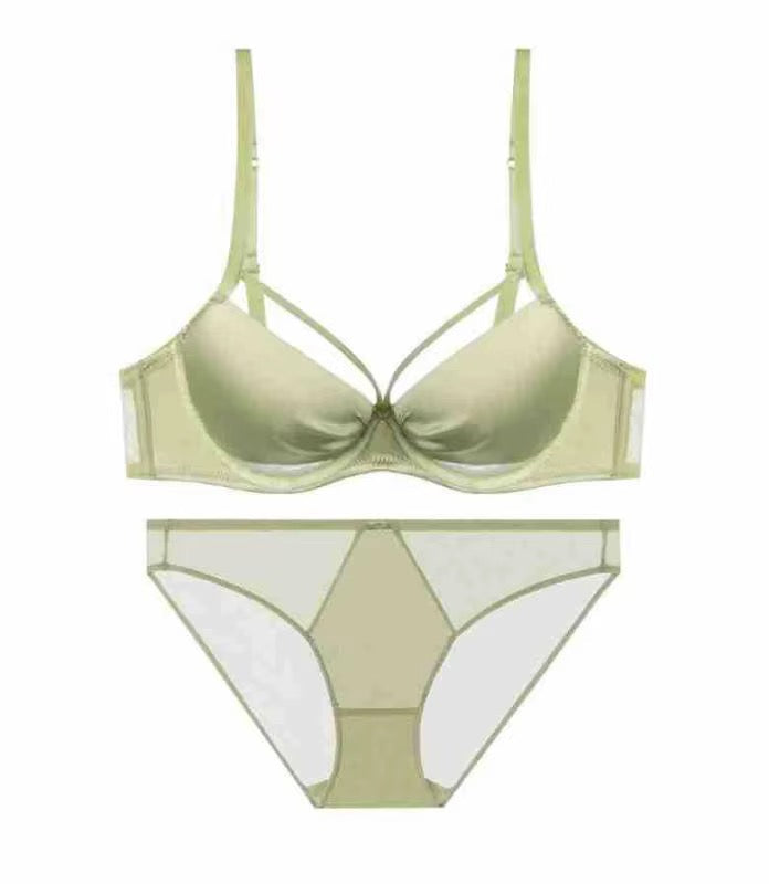 A two-piece women's lingerie set in a pale sage green color, featuring a strappy underwire bra and matching high-waisted briefs with sheer mesh side panels, displayed on a solid white background.