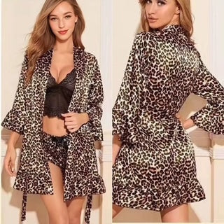 A woman modeling a leopard-print robe and matching shorts in a split-view studio photo. The left side shows her wearing the robe open over a black bralette and shorts, and the right side shows a side/back view of the robe.