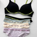Black bra and panties set with 'Baby Sweet' branding on a white background