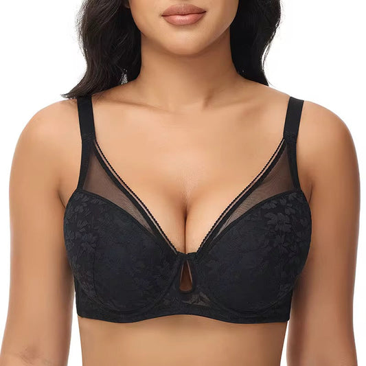 Black lace bra worn by a model on a white background