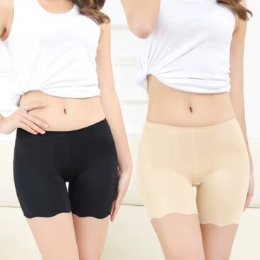 A stack of four ribbed lounge shorts with scalloped hems.